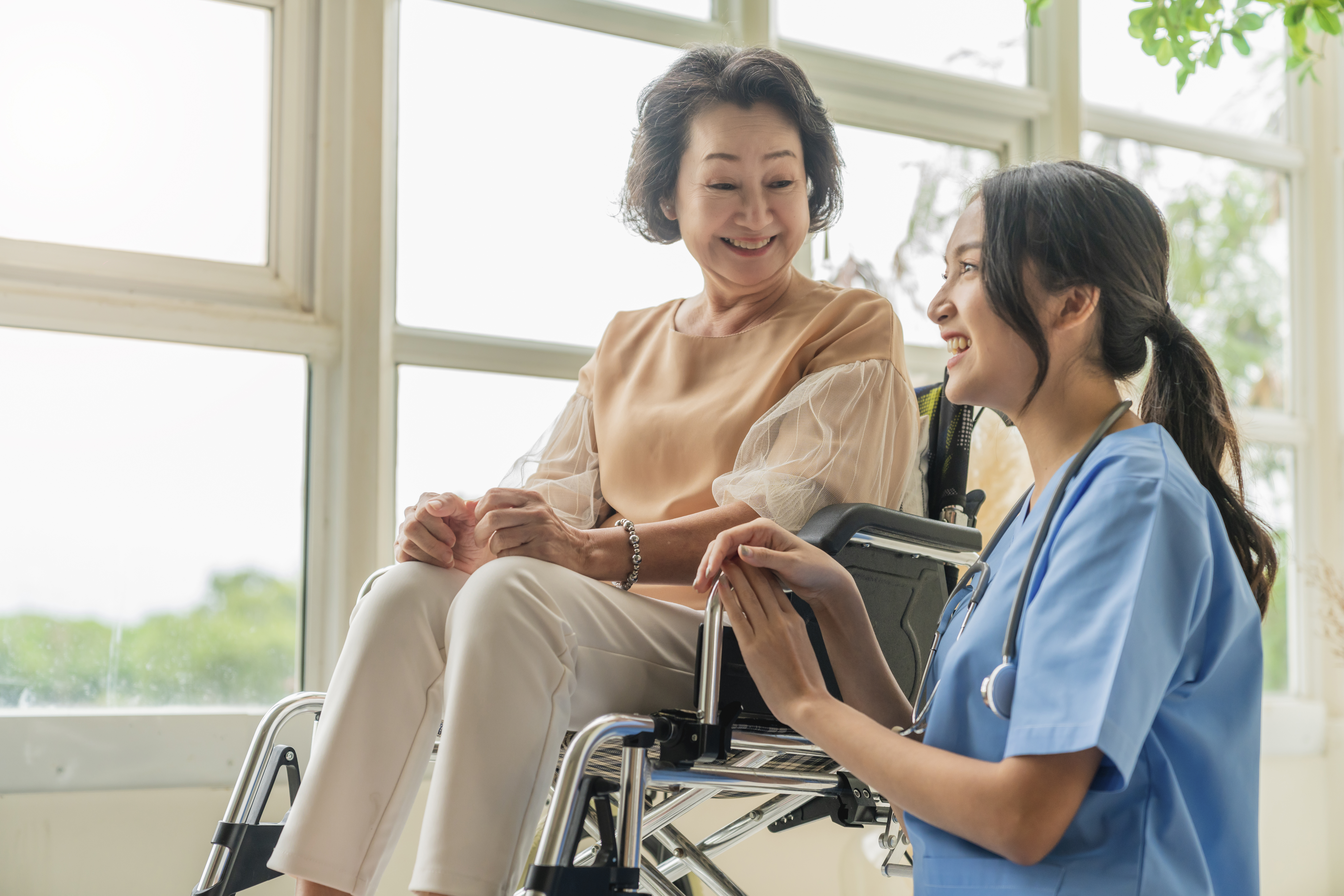 Nurse caring for a senior patient