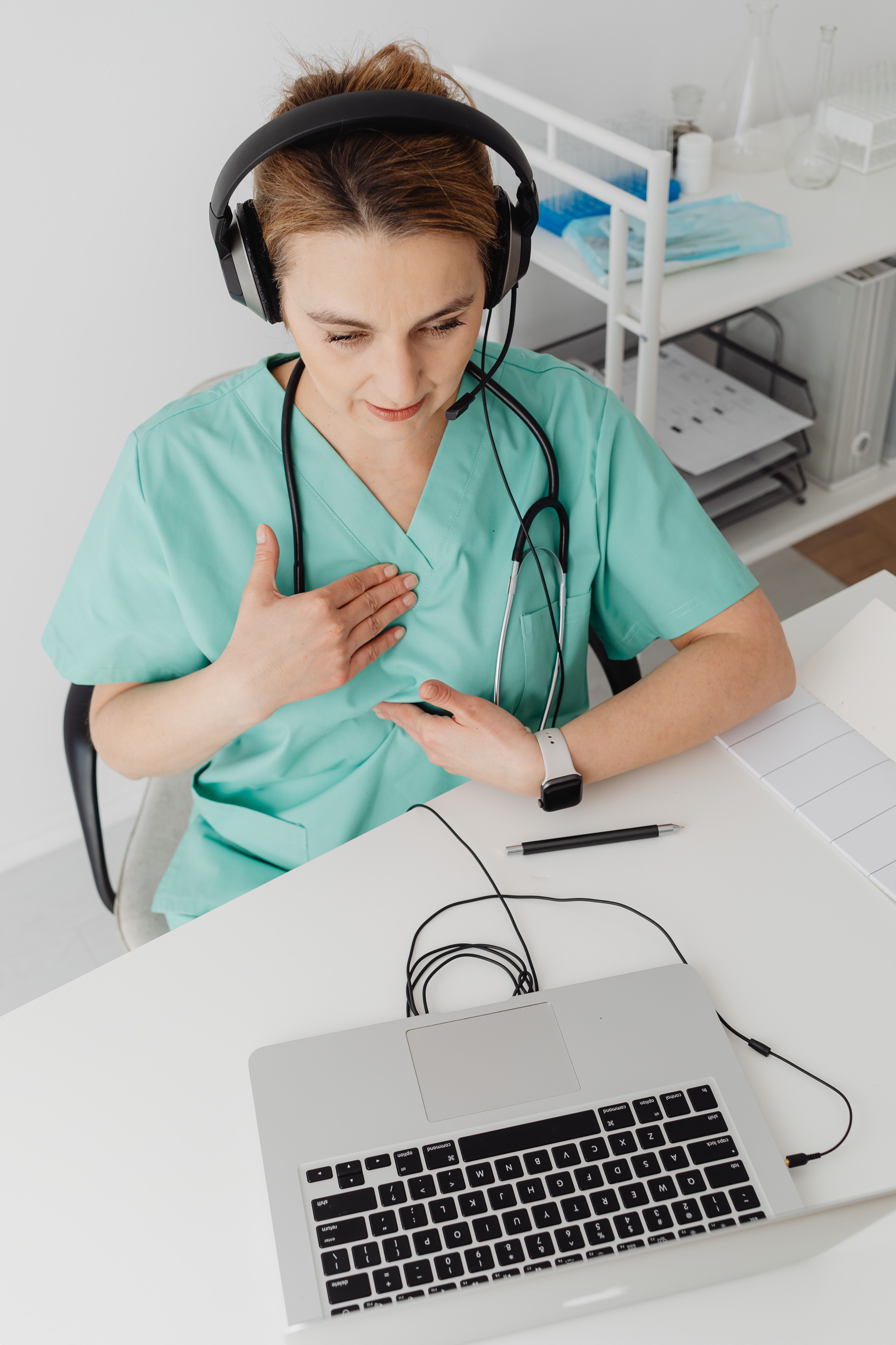 Live-in caregiver assisting a patient at home